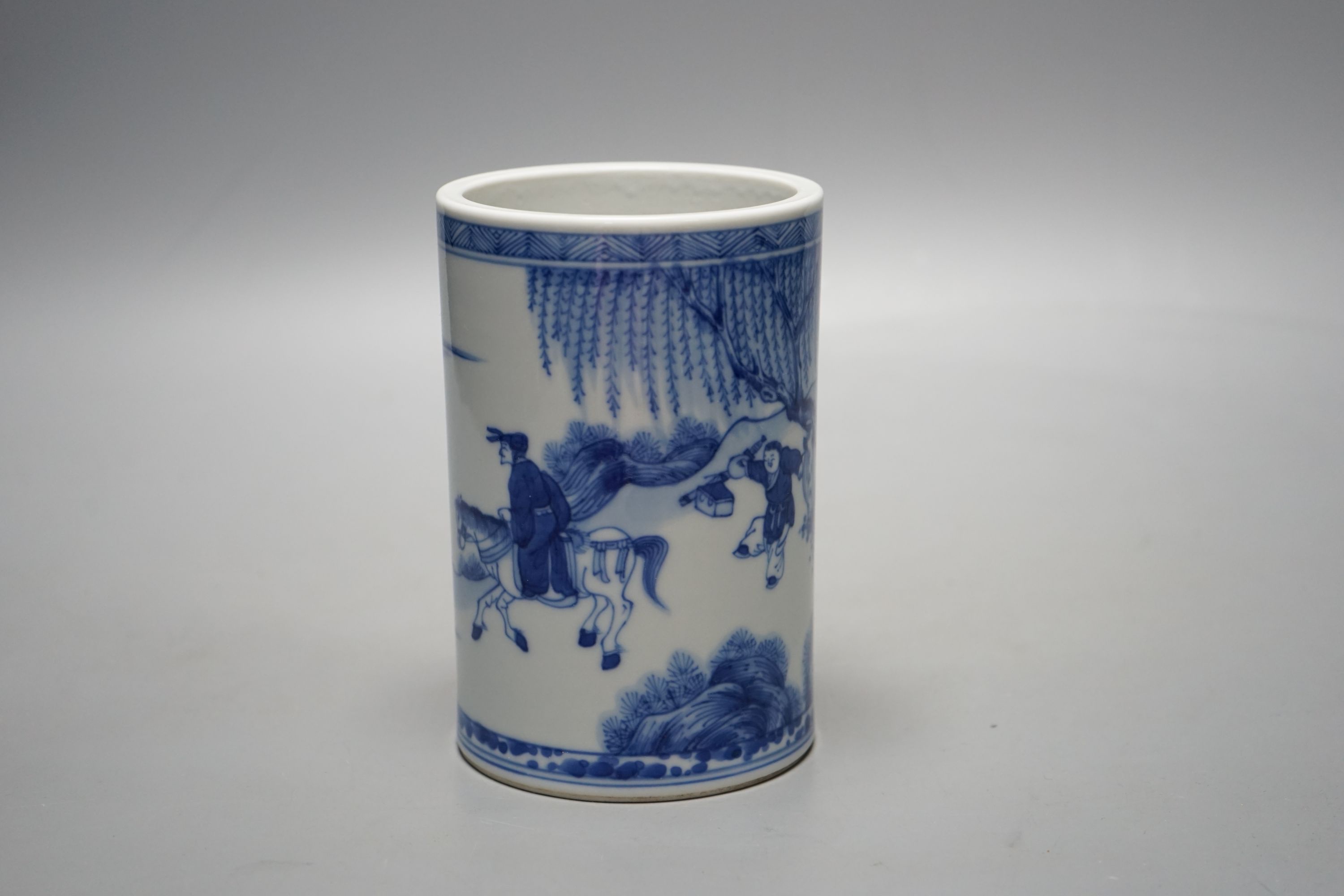 A Chinese blue and white brush pot, 14 cms high.